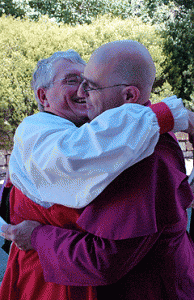 Archbishop hugs a new bishop